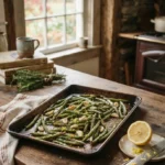 Roasted green beans with garlic and lemon zest on a sheet pan